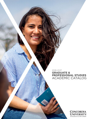 Graduate Catalog Cover: female student sitting on the Lake Michigan bluff