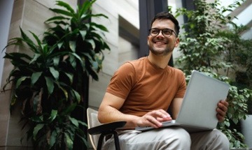 male business student at computer