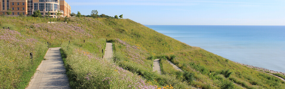 A beautiful view overlooking lake Michigan and Coburg Residence Hall.