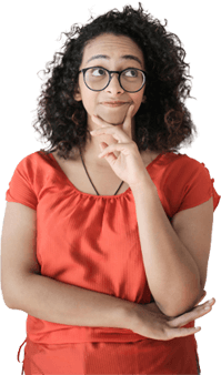 A women in an orange blouse pondering; with a smile.